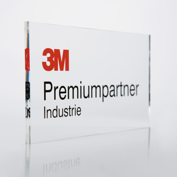 L'image montre un panneau blanc avec l'inscription 3M Premium Partner (IBZ Industrie AG) Le panneau est légèrement tourné vers la droite et sur un fond blanc (photo)