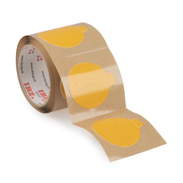 L'illustration montre des pièces étampées détachables avec une languette de saisie et une perforation. Le liner est brun, l'arrière-plan est blanc. 