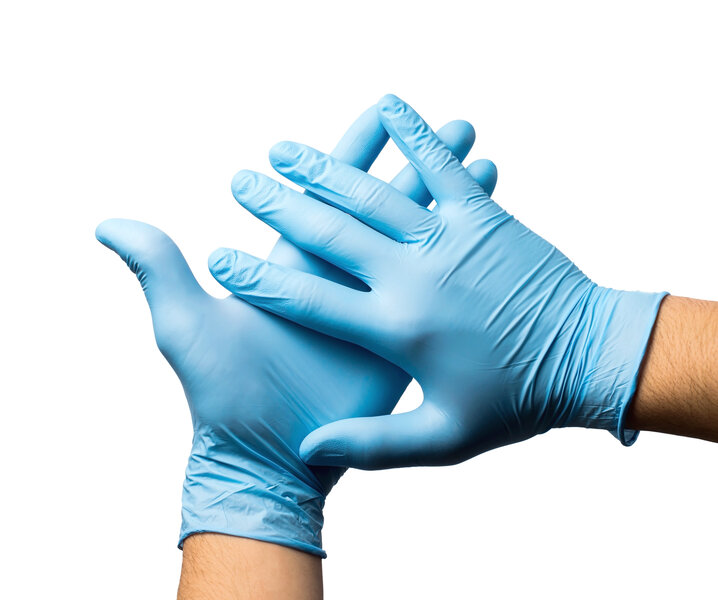 Deux gants bleus jetables en nitrile